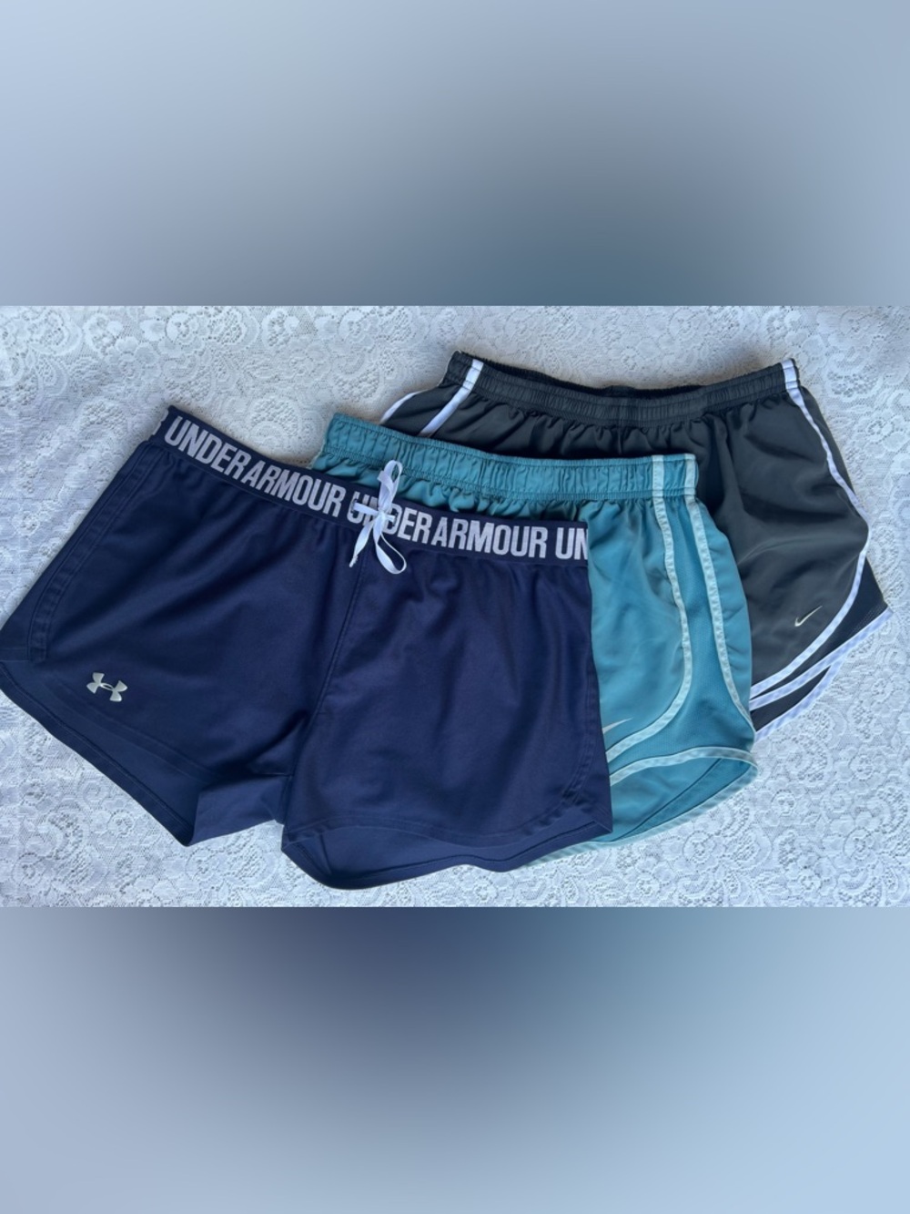 Bundle of 3-Under Armour/Nike
Women's Performance Shorts
- size Large